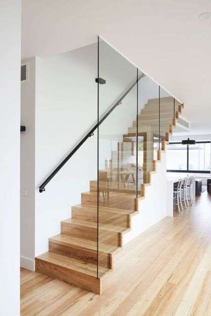 wooden staircase balustrade with vertical slat battens
