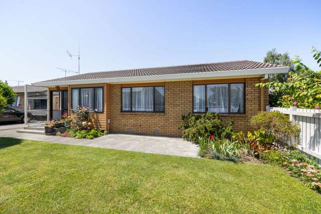 Brick & Tile Beauty in a Prime Location!