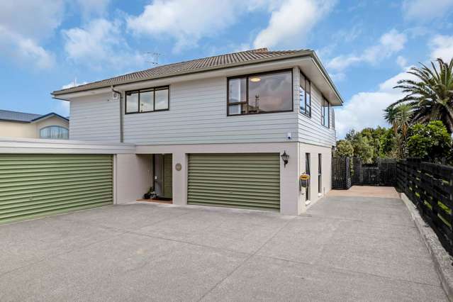 Two Garages, Ample Parking & Great Sea Views!