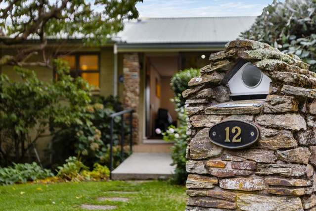 Walk to the lake from this prime address