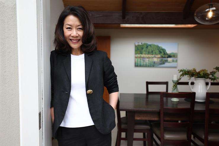 Barfoot & Thompson agent Paul Neshausen is wearing a Dolce & Gabbana sequin suit, a Versace shirt and Gucci shoes. Photo / Fiona Goodall