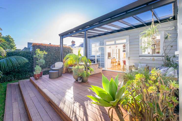 A four-bedroom home on Castleford Street, in Green Bay, Auckland, sold under the hammer for <img.4m - $50,000 above its 2021 CV. Photo / Supplied