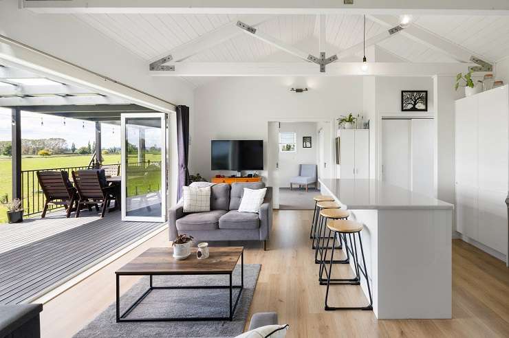 The five-bedroom, three-bathroom home on Ranby Road, in Ohaupo, was built using 12 steel shipping containers. Photo / Supplied