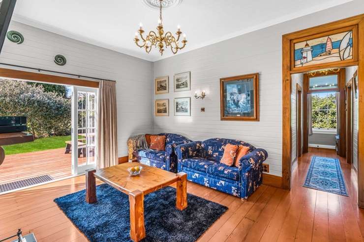 The original lighthouse keeper's cottage in Pouto, Kaipara, is up for grabs. Photo / Supplied