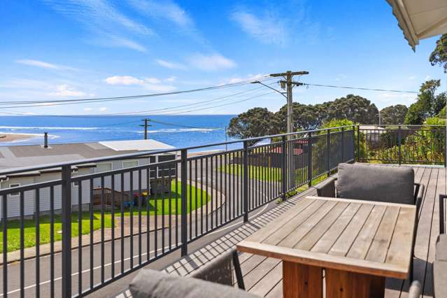 Sea views, stunning home, walk to the beach