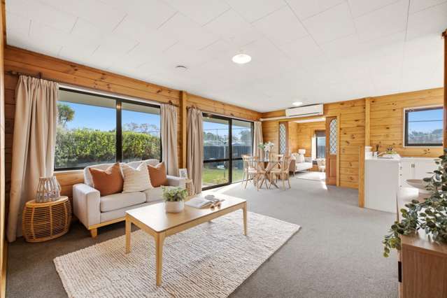 The Home & Garaging You've Been Waiting For!