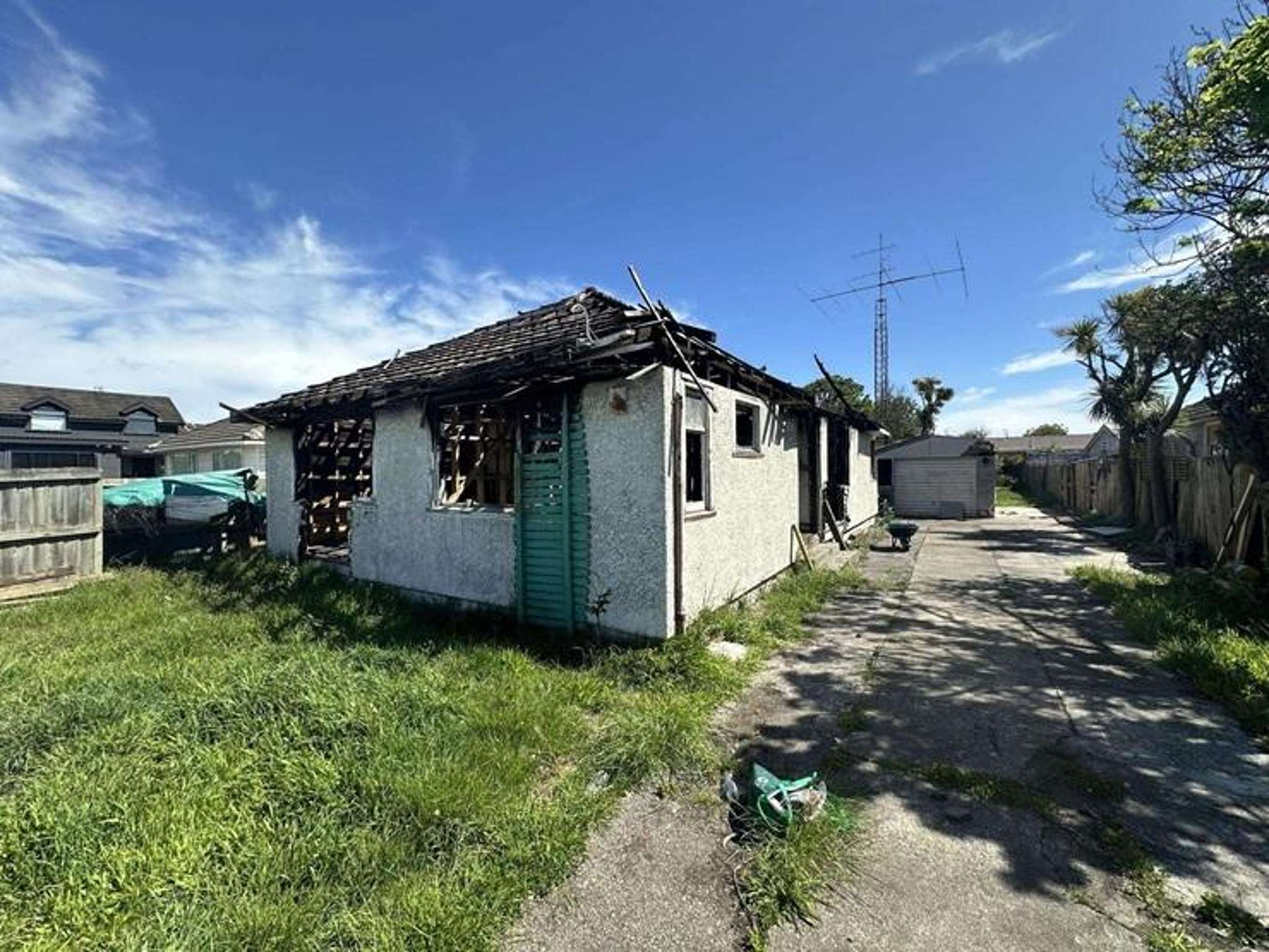 Junk-filled property back on the market after devastating fire