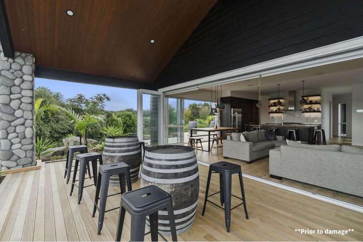 A former House of the Year contender on Capriole Crescent, in Kingseat, Auckland, fetched $920,000 at auction last month. Photo / Supplied