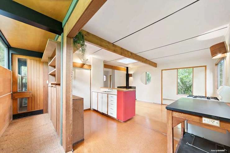 A small bush bach in Laingholm, West Auckland, has an asking price of $549,000. Photo / Supplied