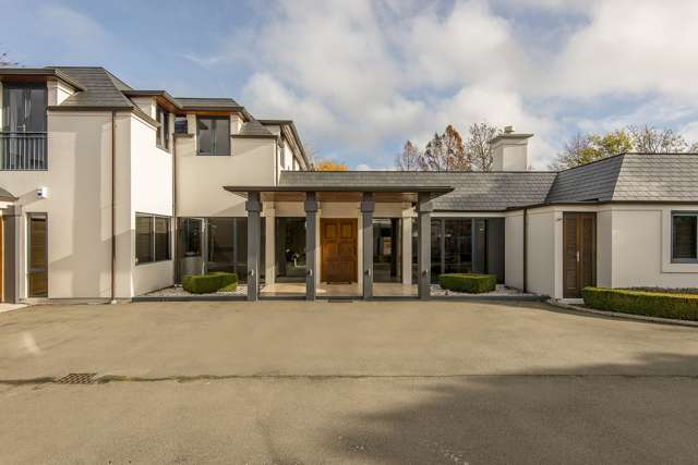 Damaged luxury home sells for $2.4m at auction