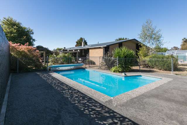 Family Living on a Sunny, Private Section