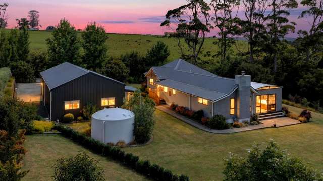 Coastal acre lifestyle, with serious garage space!