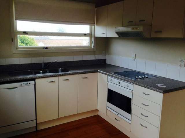 Well-Located 2-Bedroom Apartment with Carport ...