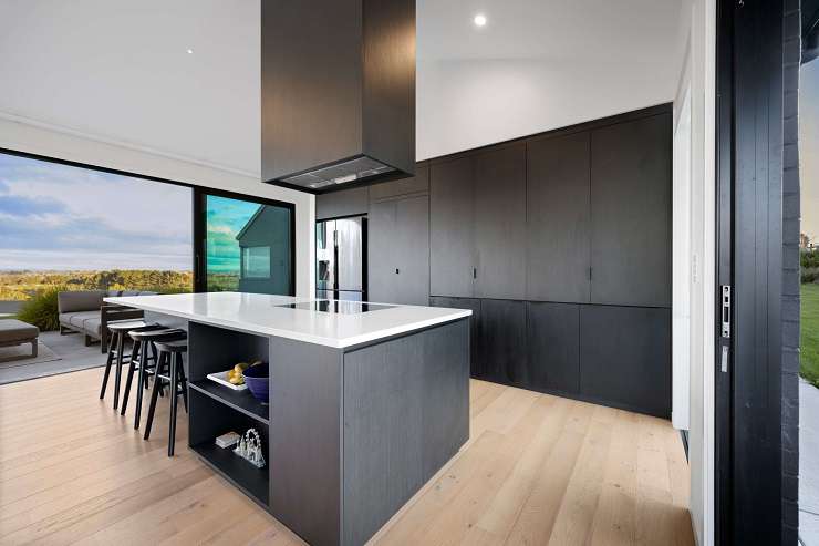 Former NZ's Hottest Baker contestant Ben Baker was very particular about how he wanted his kitchen when building his new home in Glenwood Grove, in Whatawhata. Photo / Supplied