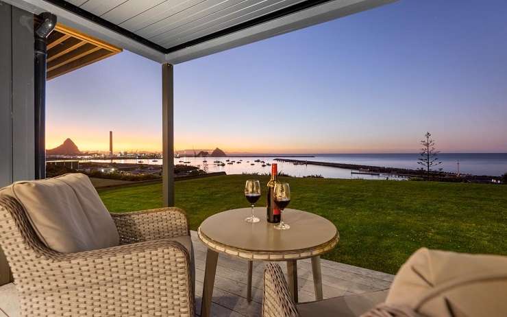 The architecturally-designed home has arguably the best views in New Plymouth. Photo / Supplied