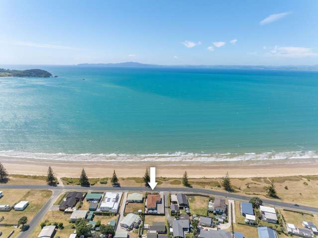 Stylish beachfront living with wide sea views