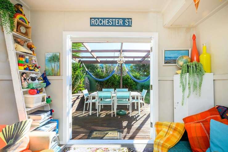 The 1950s three-bedroom bach at 15A Hall Place, in Foxton Beach, is packed with memories and treasures. Photo / Supplied