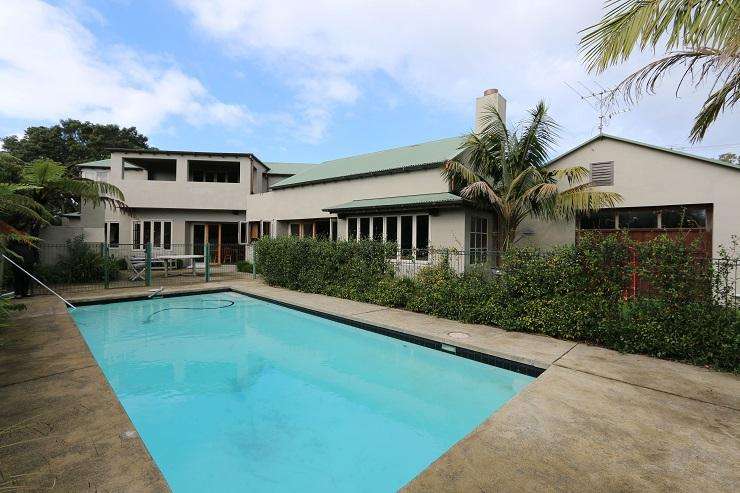 This three-bedroom house on Don Buck Road, in Massey, Auckland sold for $990,000. Photo / Supplied