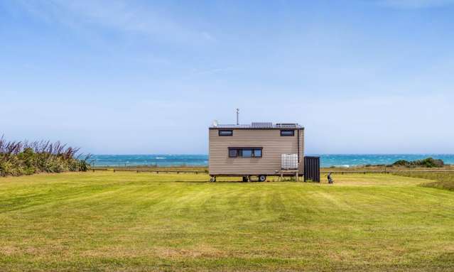 Unique coastal retreat with off-grid tiny house