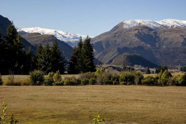 Rural Serenity Meets Alpine Grandeur