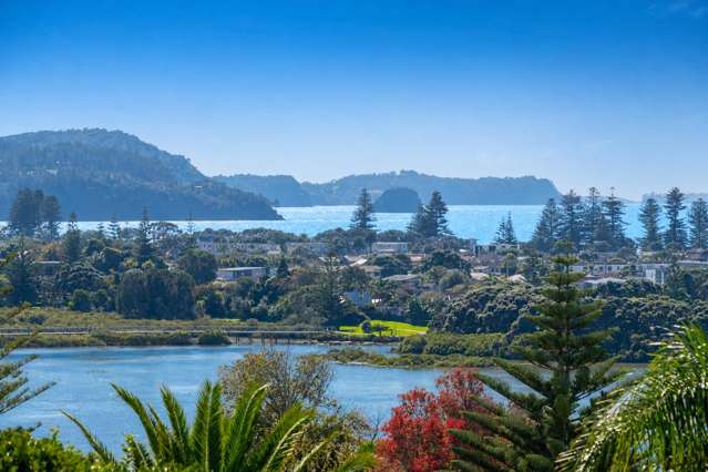 Water Views + Potential = This Will Sell!