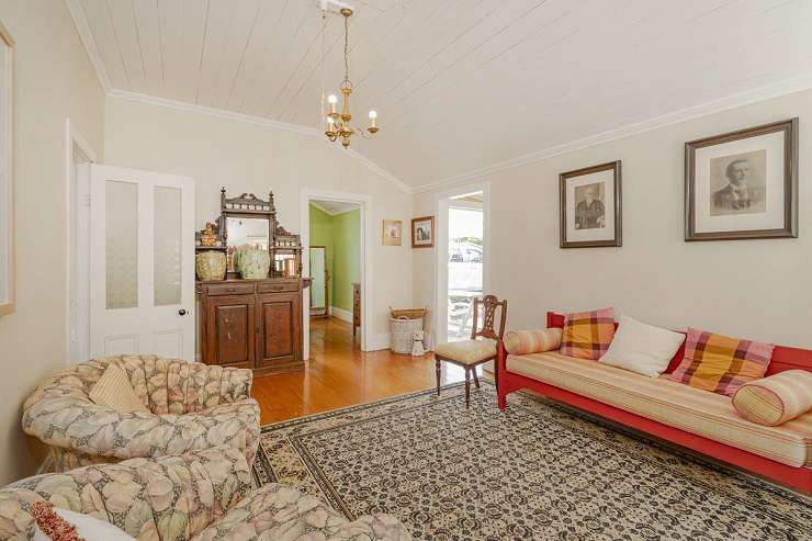 The quaint cottage at 3 Owen St, in Whitianga, has been owned by the same family for more than a century. Photo / Supplied