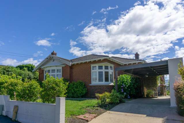 Spacious, Sunny 4 Bedroom Brick Home in Roslyn
