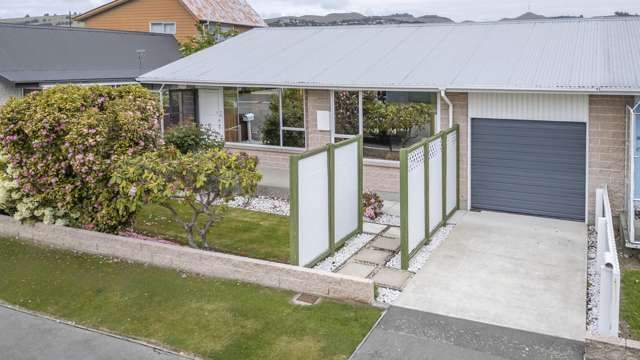 Practical Home with Garage and Garden