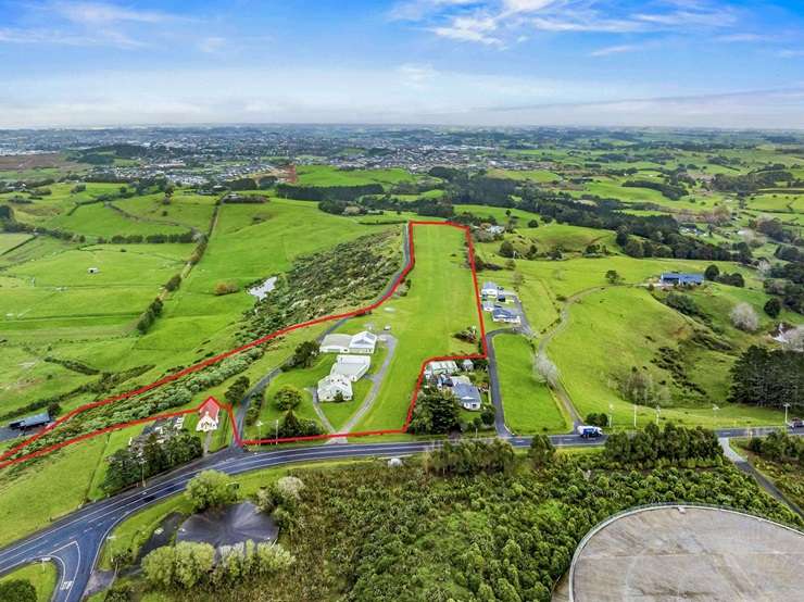 The deceased estate at 97 Runciman Road, in Pukekohe East, Auckland, has an RV of just over $2m and goes to auction on July 8. Photo / Supplied