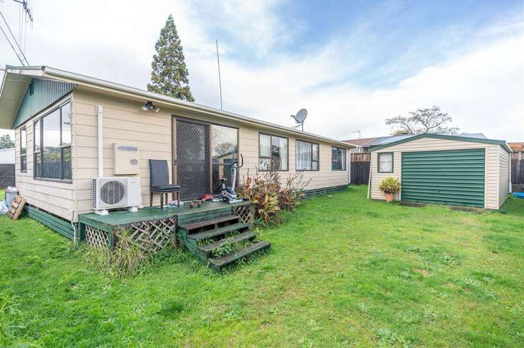 The two-bedroom cottage on Marshall Street, in Fairfield, Hamilton, was advertised as a do-up. Photo / Supplied