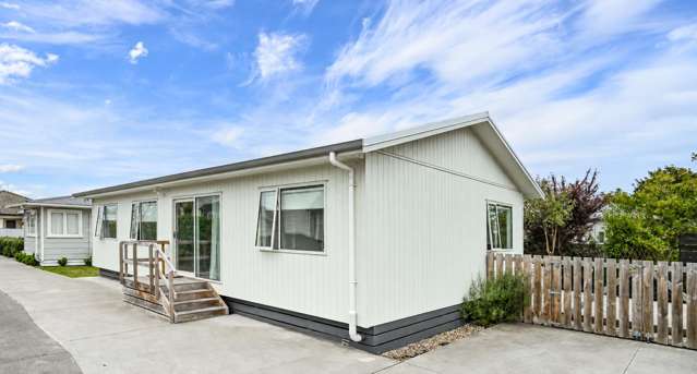 TWO HOMES - TWO INCOMES ONE TITLE.