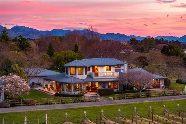 Home and vineyard on town boundary