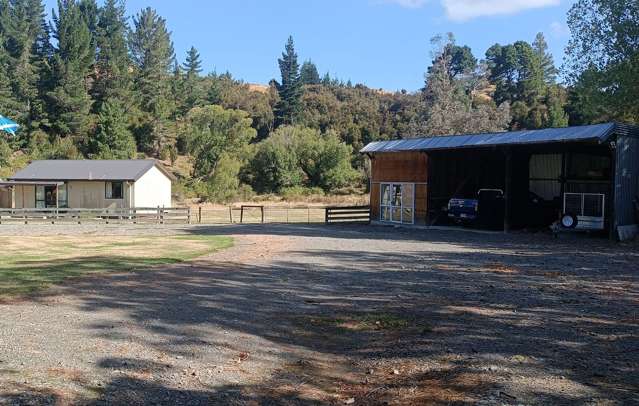 Charming Home with 15 acres of fully fenced land