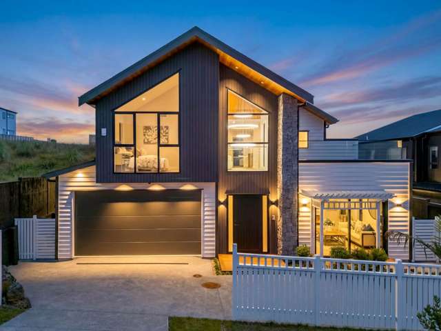 Elevated Coastal Living with Architectural Style!