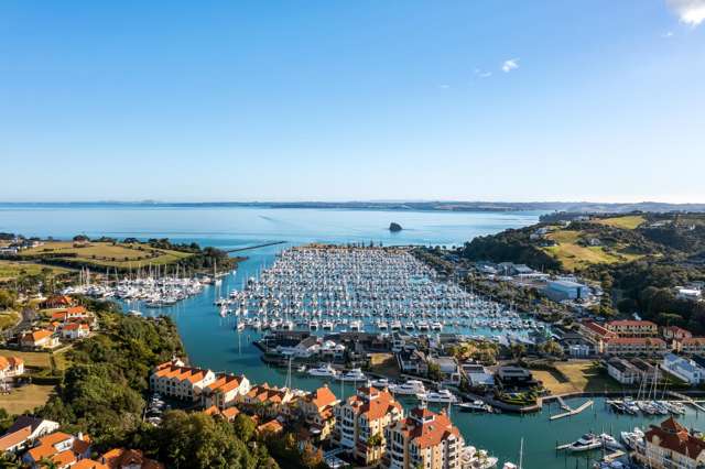 Expansive Marina Frontage & Two Exclusive Berths