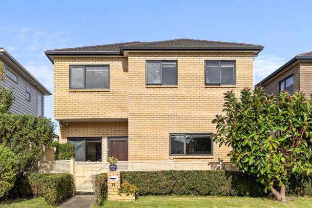 Affordable and sun-drenched brick & tile home