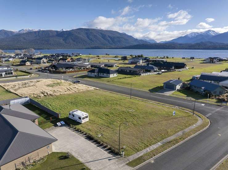 Te Anau has stunning scenery, but property prices in the lakeside town are much more affordable than those in neighbouring Queenstown. Photo / Getty images