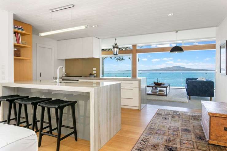 The renovated house below Merksworth Castle, on Hurstmere Road, in Auckland's Takapuna, attracted strong buyer interest. Photo / Supplied