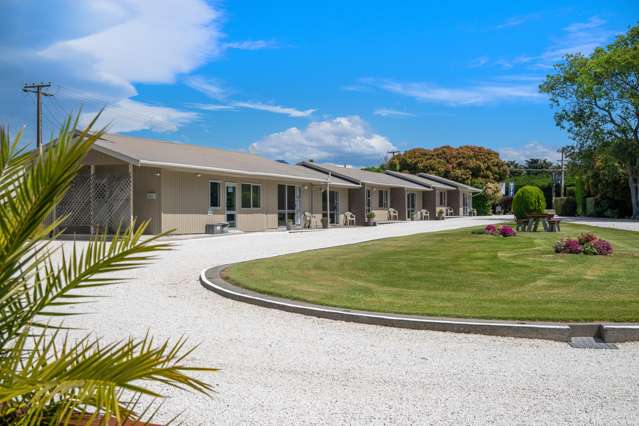 Freehold Motel & Land Package For Sale!