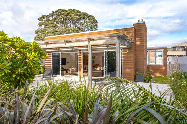 A three-bedroom brick and tile home at 61a Oceanbeach Road, in Mount Maunganui, Tauranga