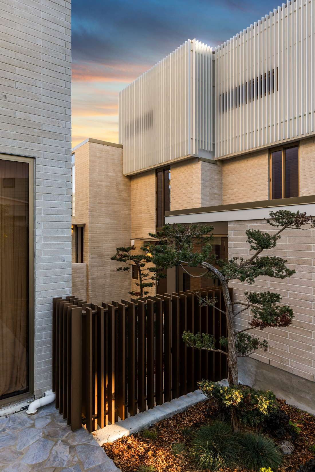 Townhouses 2 and 4 at 25 Tirotai Crescent, in Westmere, Auckland are for sale by deadline. Photo / Supplied