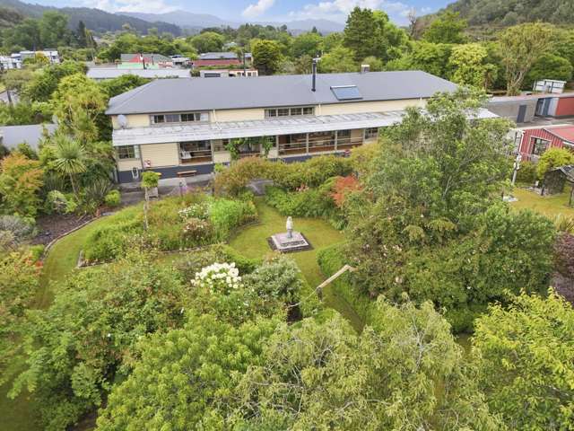 Multiple Dwellings with Income Potential!