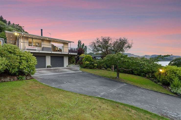 The former All Blacks coach built a bar and gym in his seaside home three years ago. Photo / Supplied