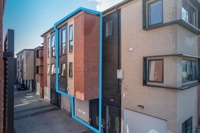 Near New 2024 Brick Townhouse