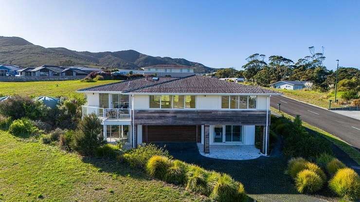 One of the four homes at Carrington Estate golf course and lodge which sold under the hammer. Photo / Supplied