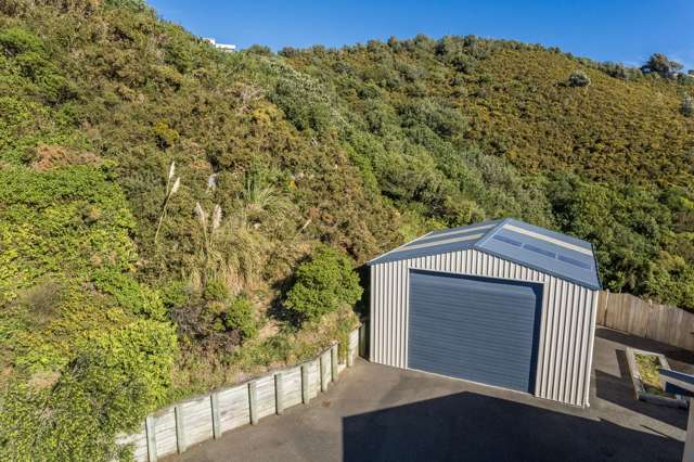 BIG GARAGE AND SUBSTANTIAL HOUSE PLANS.