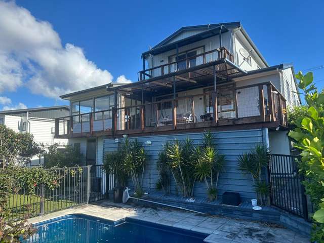 Stunning multi level home with Salt water Pool and Solar power