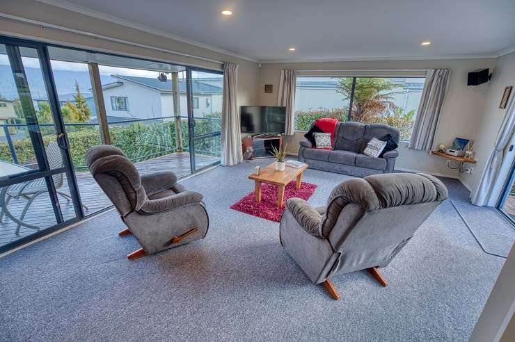 A four-bedroom, two-bathroom home on Ranui Place, in Moana, sold under the hammer this week for <img.19m. Photo / Supplied