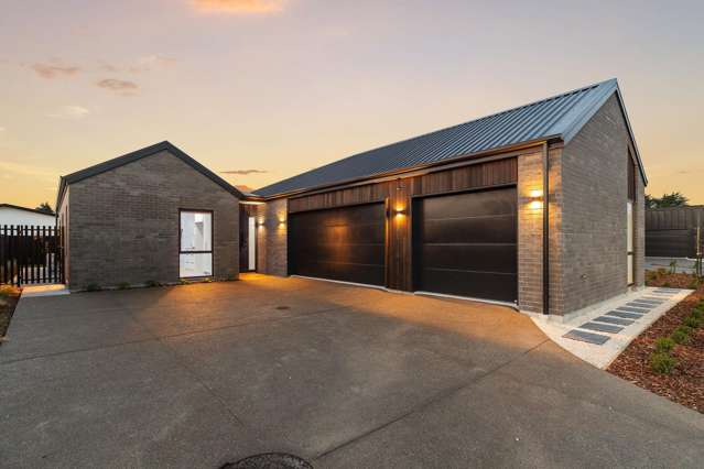 Brand New and Triple Car Garaging!