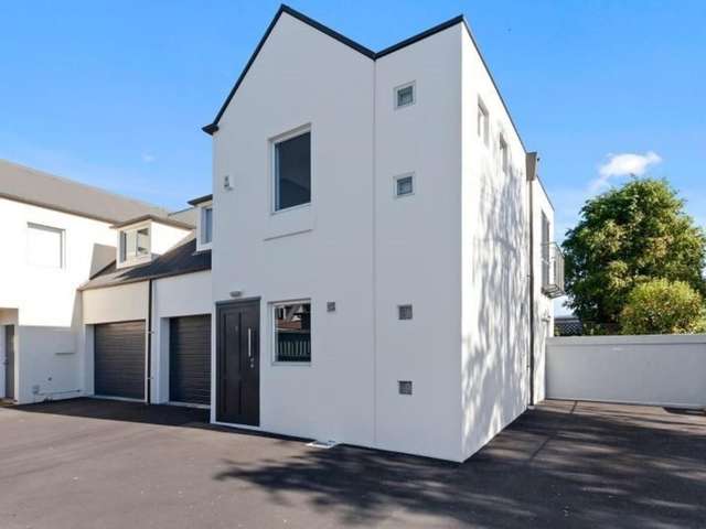 Fully Furnished 2 - 3 Bedroom City Townhouse with Internal Access Garage!
